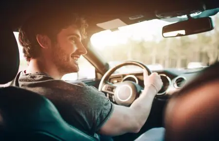 Man driving happy | CarMoney.co.uk