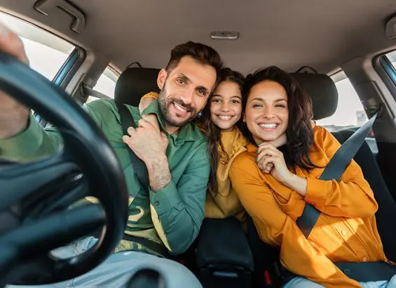 Family driving new car | CarMoney.co.uk