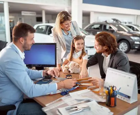 Family at Dealer | CarMoney.co.uk